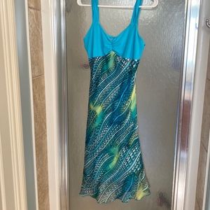 Never worn dress (tags were removed) in vibrant green & teal colors